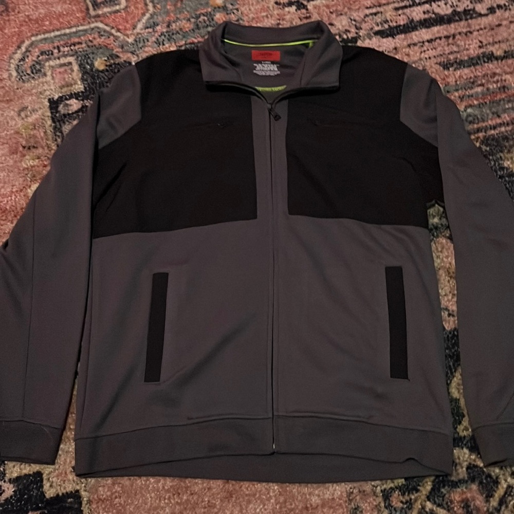 I am selling a zip up polo jacket! Size XL